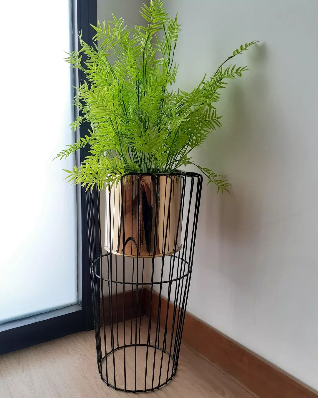 Black and Gold Planter With Plant